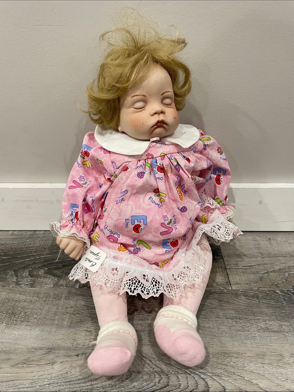 Pink Sleeping Baby Doll in Lace-Trim Dress